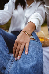 A hand of the woman with a bracelet