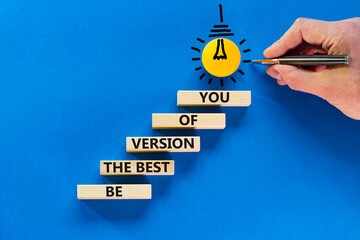 Best version of you symbol. Wooden blocks with words Be the best version of you on blue background,...
