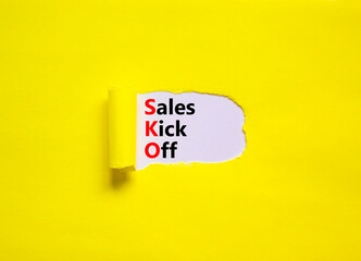 SKO sails kick off symbol. Concept words SKO sails kick off on white paper. Beautiful yellow background, copy space. Business and SKO sails kick off concept. - obrazy, fototapety, plakaty