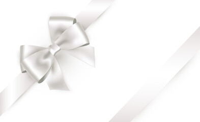 Shiny white satin ribbon on white background