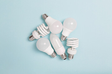 energy saving light bulbs on blue background. LED bulbs. Energy saver. Eco friendly. Energy-effective lamps. Reduce and save the planet. Top view