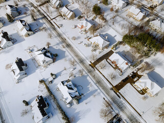 Winter white landscape small town in the houses complex area covered by snow