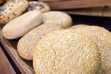 blurry composition of bread loaves for burgers