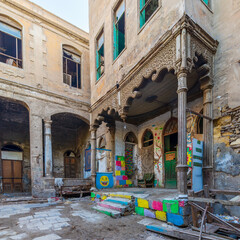 Fototapeta na wymiar Day shot of Bayt Madkour Pasha, historical abandoned house located at Souq Al Selah Street, Darb Al Ahmar district, Old Cairo, Egypt
