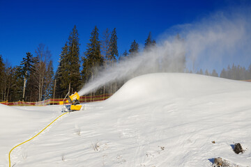 The slope of Bukovel ski resort with working snow machine, Ukraine - 474975830