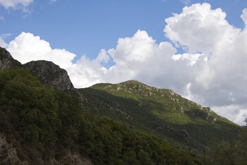 Fototapeta na wymiar Clouds over the mountains. Corfu. Greece