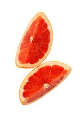 Two pieces of fresh grapefruit close-up isolated on a white background.