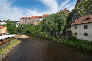 Fototapeta na wymiar Day view of Cesky Krumlov and it's castle by the Vltava river - Cesky Krumlov, Czech Republic