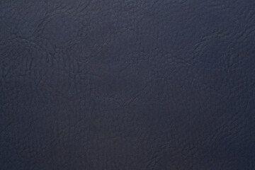 blue artificial leather with waves and folds on PVC base