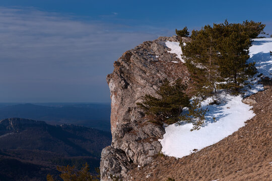 Precipice at the edge of Babugan yayla, Crimea in winter
