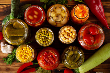 Jars of various pickled vegetables. Canned food