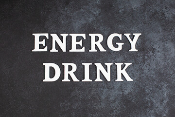 Words ENERGY DRINK on a dark background.