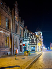 Fototapeta premium Inowroclaw, Poland - August 10, 2021. Old building by main square in Krolowej Jadwigi street