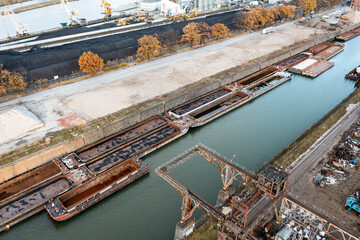 Anchorage for coal barges. Coal storage and river transport. View from a great height