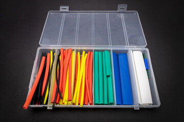 A lot of heat shrink tubes to protect the insulation of cables, close-up
