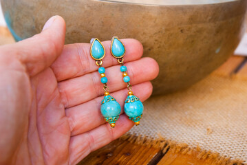 Turquoise gold stud long earrings.