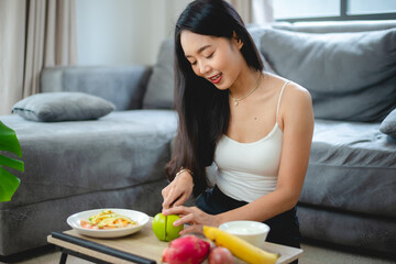 Obraz na płótnie Canvas healthy clean food concept, Asian woman with fresh vegetable for diet lifestyle, happy vegetarian