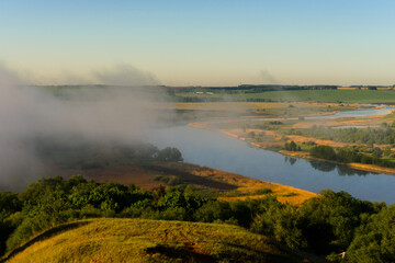 Fototapeta na wymiar mist over the river