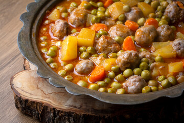 Turkish Food Green Pea Stew with Meatballs - Kofte or Kofta Bezelye. (Turkish name; kofteli bezelye)