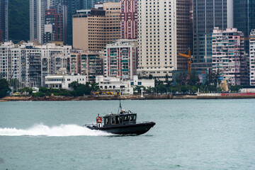 Obraz premium Hong Kong, China skyscraper building in modern city landscape, business urban center of Asia