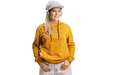 Young female listening to music on headphones