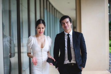 business partner with man and woman talking together in modern office, work meeting