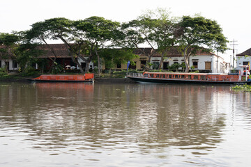 Fototapeta na wymiar Boats docked in the bank of the Magdalena River