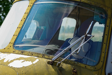 Fototapeta na wymiar Metal wiper on the front window of the helicopter.