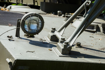 A circular army light on the vehicle.