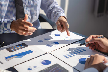 Business managers working with new startup in modern loft.Analyze reports, plans, Business people discussion working concept
