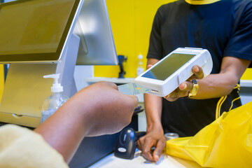 selective focus of electronic device, money transaction concept