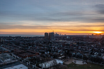 downtown Toronto skyline  sunset drone view  in December  with downtown houses and buildings 