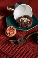 Chocolate Christmas Cookies with walnuts and chocolate chips on the table. Horizontal, biscuits festive background.