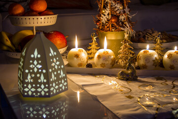 Christmas decoration with four candles, gold and white color