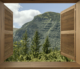 Beautiful view from the house in the forest. Window with a picturesque view on the mountain's . Vacation home for the rest near the forest.