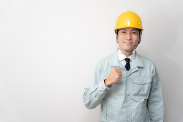 現場監督とヘルメットと建築