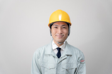 現場監督とヘルメットと建築