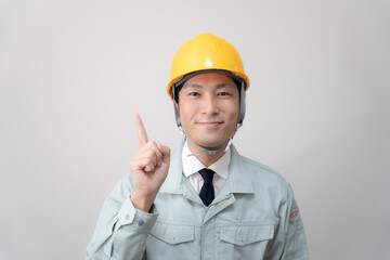 現場監督とヘルメットと建築