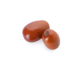 Two ripe red dates on white background, top view