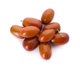 Heap of ripe red dates on white background, top view