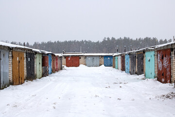 Garage doors in a row in the snow