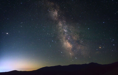 starry night sky with brilliant galaxy