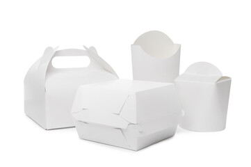Set of different paper containers for food on white background