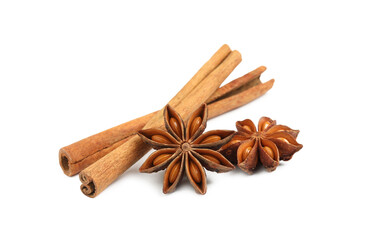 Dry anise stars and cinnamon sticks on white background