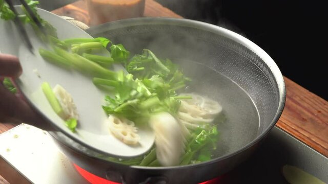 Chinese style home-cooked stir-fried celery and lotus root slices
