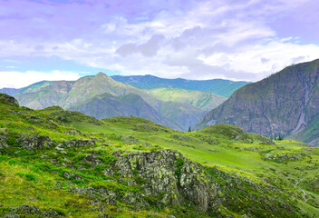 Altai mountains under a cloudy blue sky