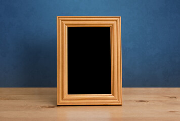 frame on table, blue wall