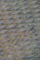 Graphic diamond pattern rustic metal background, as an abstract background
