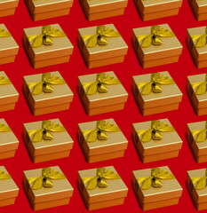 Seamless pattern of holiday gift boxes wrapped in craft paper with a gold bow on red background. Top view.