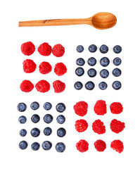 Wooden spoon with tasty ripe berries on white background